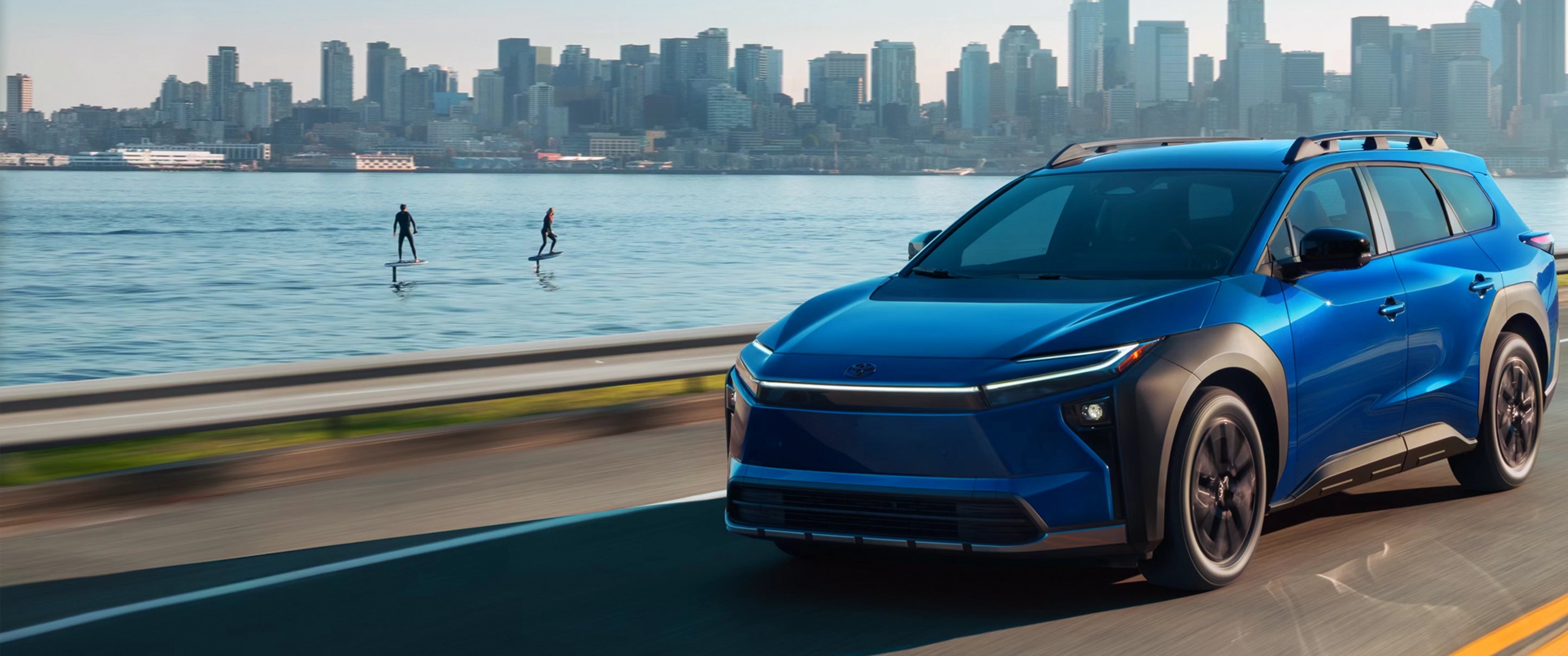 Silver Mercedes-Benz SUV on a coastal highway